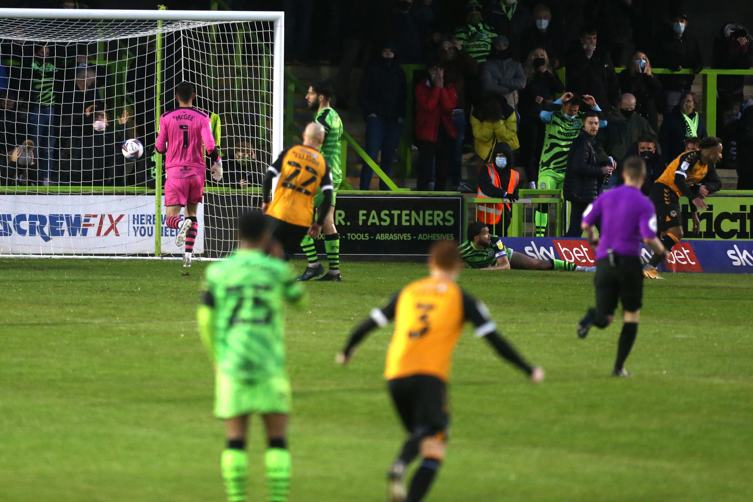 Newport Countys Nicky Maynard scores his sides third goal during the Sky Bet League Two semi final, second leg match at The New Lawn Stadium, Nailsworth. Picture date: Sunday May 23, 2021.