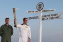 THE JOURNEY BEGINS: Ben Ainslie holds the Olympic Torch as he begins the first leg of the relay (Chris Radburn/LOCOG/PA Wire)