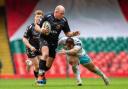 INFLUENTIAL: Prop Brok Harris on the charge for the Dragons