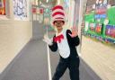 A child dressed as the 'Cat in the Hat' but there is concern fancy dress outfits are making events such as World Book Day too expensive for parents.