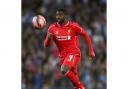 Kolo Toure has signed a contract extension to stay at Liverpool
