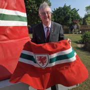 Wales First Minister Mark Drakeford in front of the giant bucket hat on the Corniche in Doha, Qatar during the FIFA World Cup 2022. Picture date: Sunday November 20, 2022.