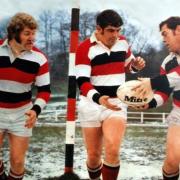 The legendary Pontypool front row: Charlie Faulkner is pictured holding the ball.