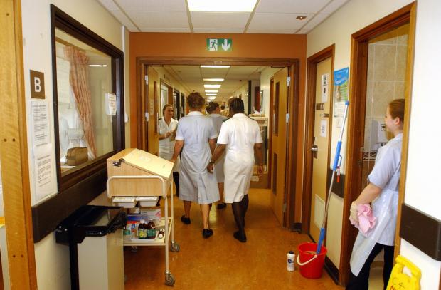 Operating theatres in Wales are under-used - report.