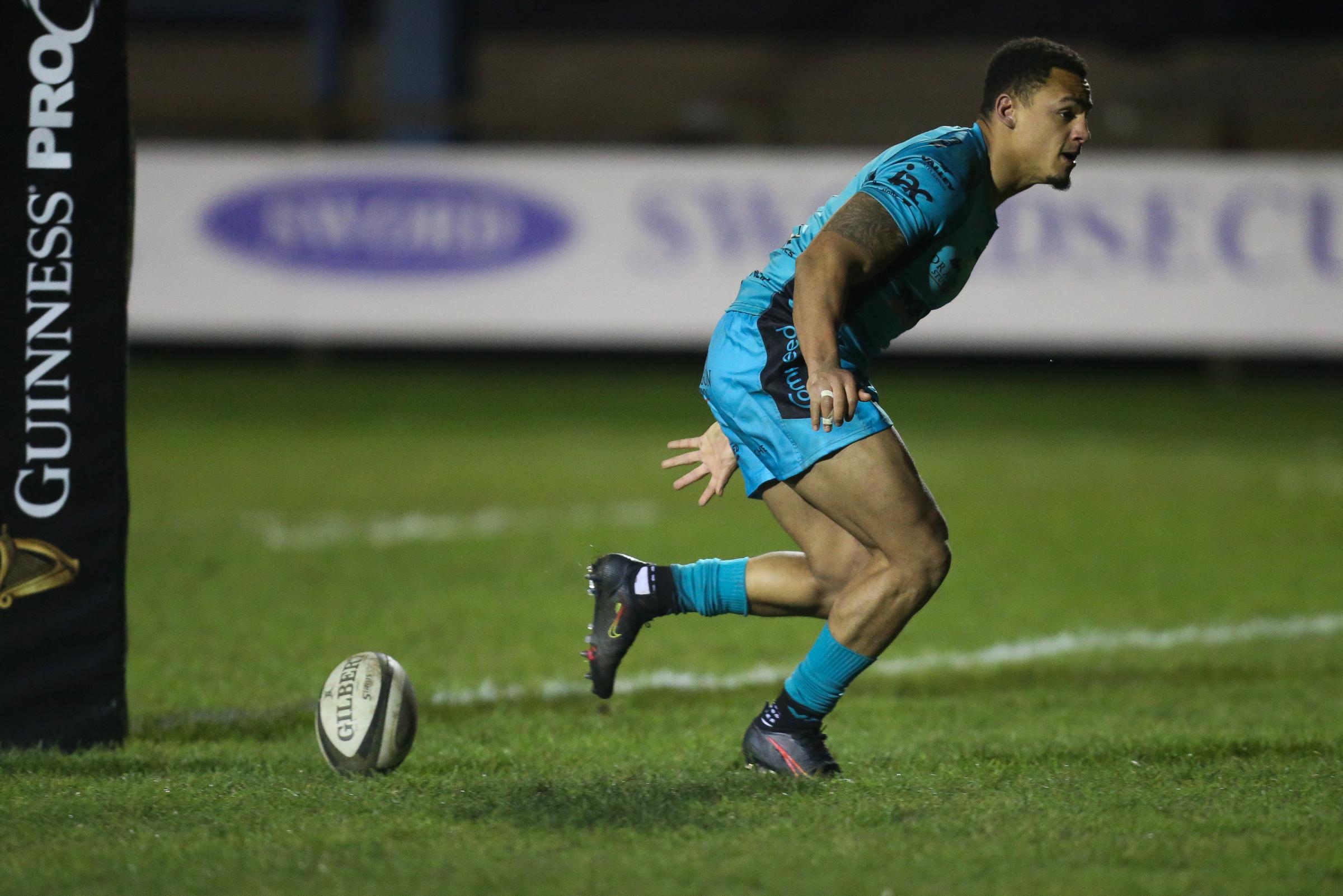 TRY TIME: Ashton Hewitt clinches the win for the Dragons against the Ospreys