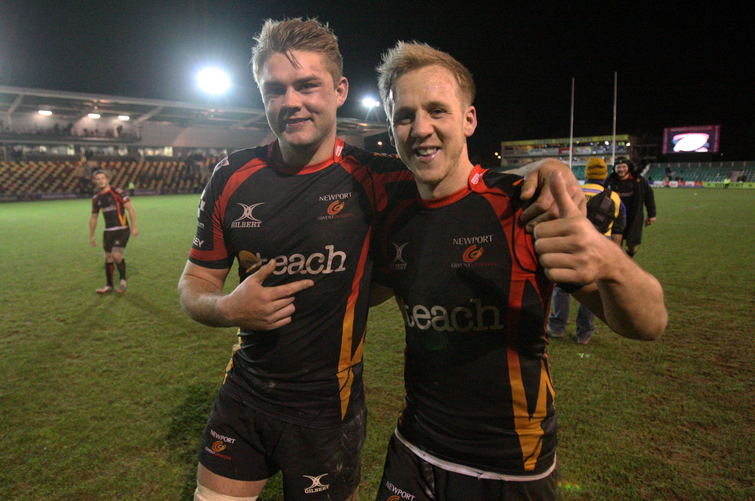 GLORY: Lewis Evans and Ashley Smith celebrate the Dragons 2013 win against Cardiff Blues