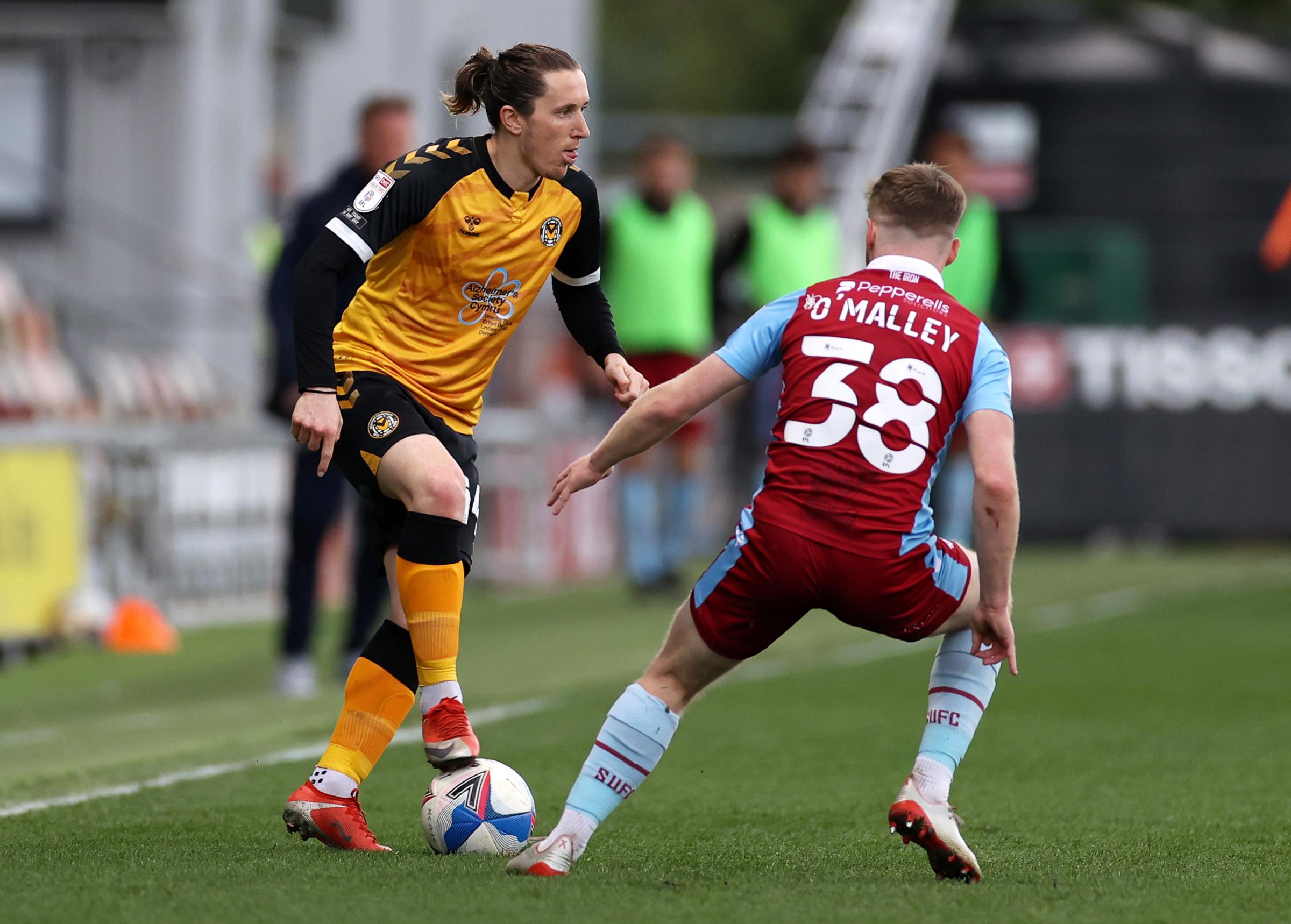 27.04.21 - Newport County v Scunthorpe United - SkyBet League Two - Aaron Lewis of Newport County is challenged by Mason OMalley of Scunthorpe.