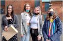 Chloe Taylor, Tegan Roberts and Ocean Rideout, and Callum Negrotti, collecting their GCSE results at Ysgol Gyfun Gwynllyw.