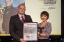 Aaron Reeks accepts the Volunteer Award from NatWest’s Gemma Casey