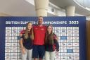 Tom Croke, head coach at Torfane Dolphins, with (L-R) Carys Croke and Meghan Willis. Picture: Suzanne Willis/Cwmbran Life