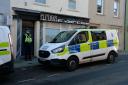 Officers at the scene of the incident in Upper Market Street in Haverfordwest.