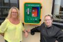 Heather Cox and Roz Robertson with their defibrillator at the Queen Victoria Inn in Blaenavon. Picture: Heather Cox