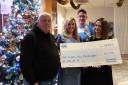 Ray Taylor, Emma Waldron, Ioan Protheroe and Emily Hedley with the money raised from the event at Llanyrafon Social Club.