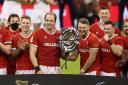 Captain Alun Wyn Jones of Wales holds the Triple Crown with Liam Williams, Dan Biggar, Adam Beard and Elliot Dee . Picture: Huw Evans Picture Agency