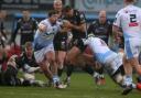 Jamie Roberts of Dragons is tackled by Brad Thyer and Josh Turnbull of Cardiff Blues. Picture: Huw Evans Agency