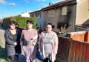 Maria Richards, Terrie Davies, and Christine Edwards outside their mum's home - where a fire broke out on Friday.
