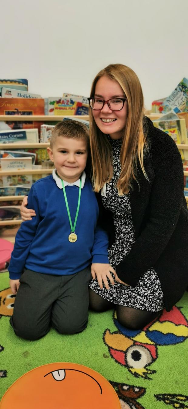 Free Press Series: Archie Fielding, the winner of Torfaen Libraries' Summer Reading Challenge 2021, with his mum Nicole Fielding. Picture: Torfaen council.
