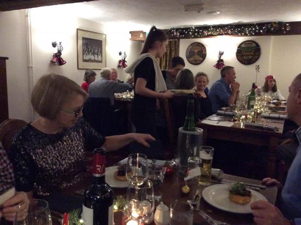 Free Press Series: People enjoying Christmas dinner at a busy Woodlands Tavern. (Picture: Mark Vosloo)