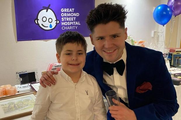 Finley Kamil with Russell Jones at a fundraising event for Great Ormond Street Hospital. Picture: Russell Jones.
