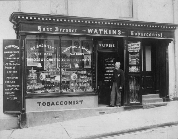 Free Press Series: Valentine Edward Watkins seen here in the doorway of his tobacco shop on Chepstow High Street. Photograph from the collections of Chepstow Museum ©Monmouthshire Museums 