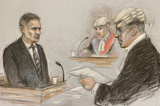 Court artist sketch by Elizabeth Cook of former Manchester United footballer Ryan Giggs being questioned by Chris Daw QC as he gives evidence at Manchester Crown Court. Picture: PA