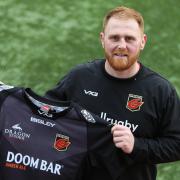 DEAL: Dan Baker is staying with the Dragons