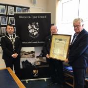 Chris Jones (right) presents Cllr Alan Jones and Cllr Liam Cowles with the framed thank you letter his great-great-grandfather Charles Jordan received from the Workmen’s Hall Committee. Picture: Blaenavon Town Council