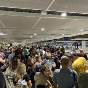 Picture taken with permission from the Twitter feed @KieronSheridan of passengers queueing to get through security at Bristol Airport this morning.