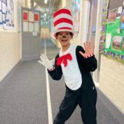 A child dressed as the 'Cat in the Hat' but there is concern fancy dress outfits are making events such as World Book Day too expensive for parents.