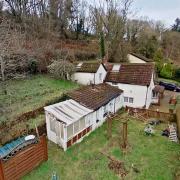 Chocolate box: Kilima Cottage, in Upper Redbrook, in the heart of the Wye Valley, near Monmouth, is being sold online at Paul Fosh Auctions