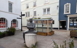 'Ridiculous location' - bin store installed behind statue near town high street